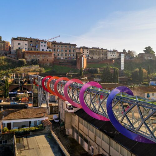 Endless Sunset, a work by Patrick Tuttofuoco on a panoramic walkway